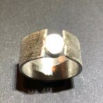 R006 ring zilver met cirkelverbinding