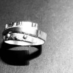 R008 ring zilver smaller wordend overlappend