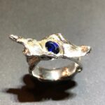 R031 ring zilver met 1 blauwe ovale zirconia 6 mm